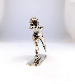 Ezüst korcsolyázó figura