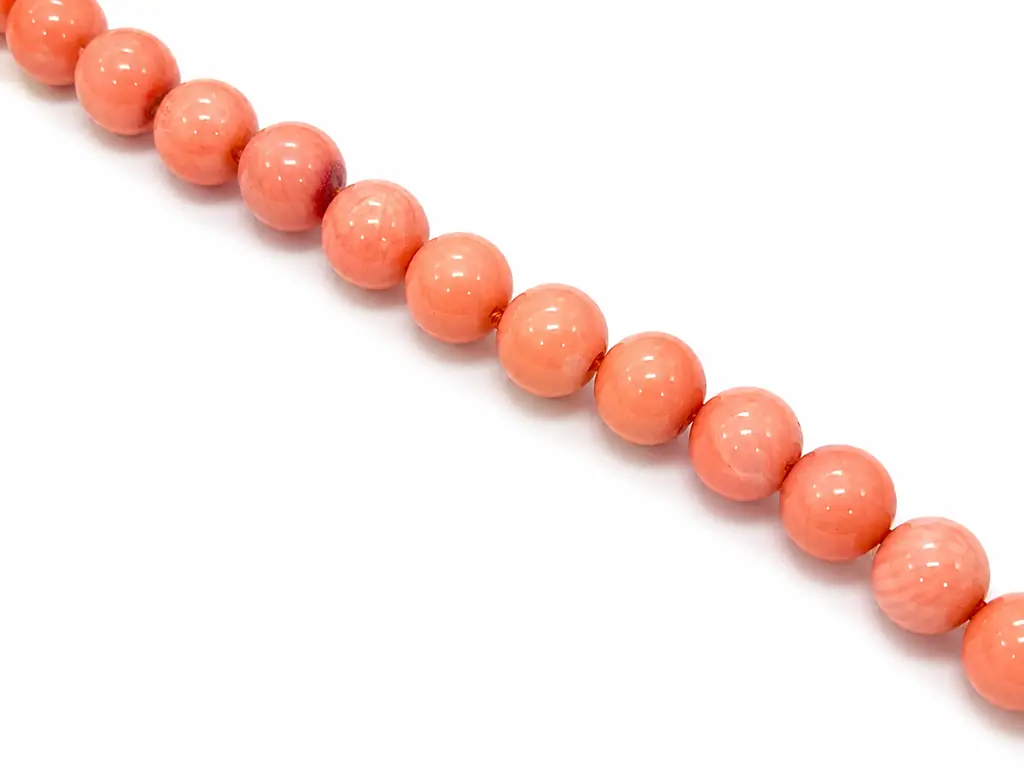 halvány rózsaszín bambuszkorall gyöngy karkötő ezüst kapoccal